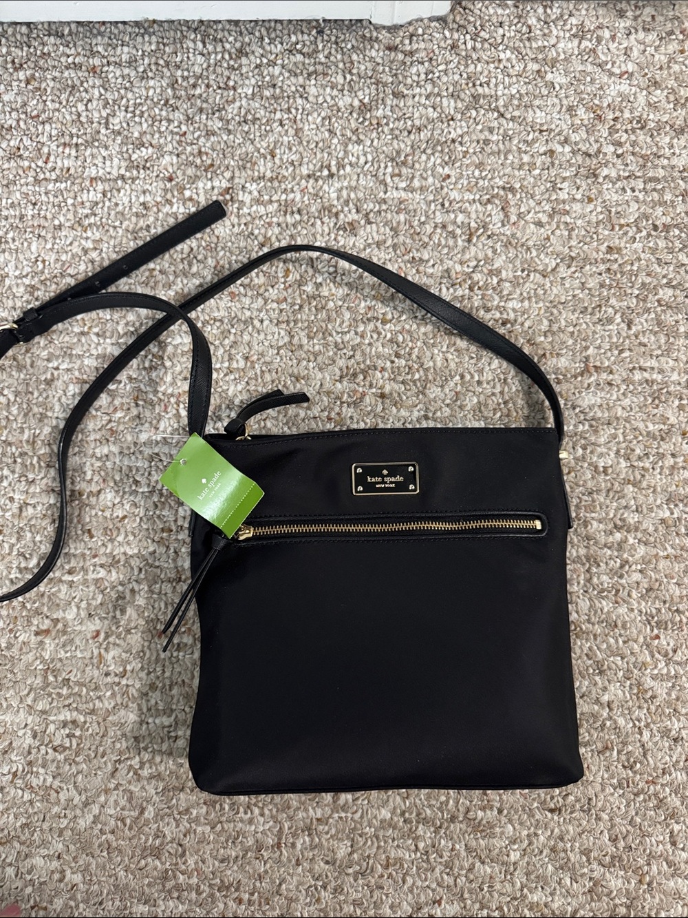 kate spade black crossbody with gold hardware